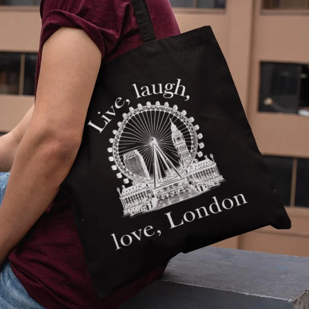 Black Love London City tote bag with London Eye and Big Ben design, carried outdoors by a man