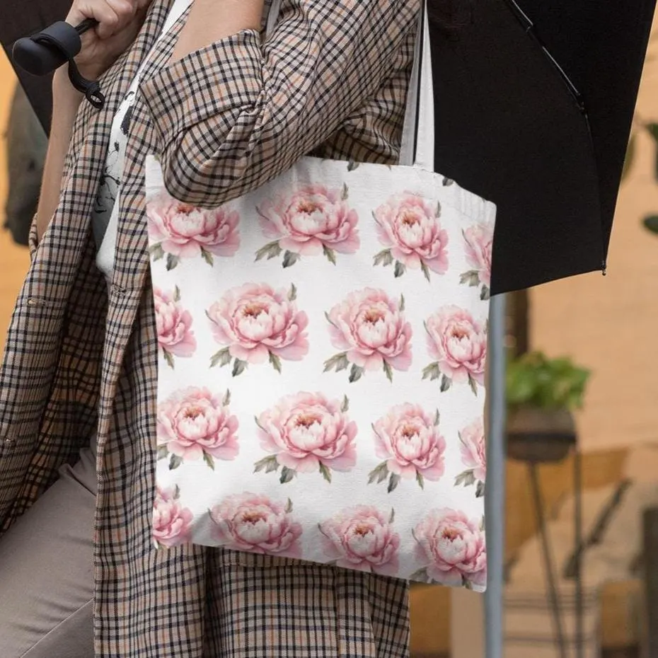 Woman carrying Pink Peony Bloom Pattern Floral Design Tote Bag in city street, showing elegant floral style