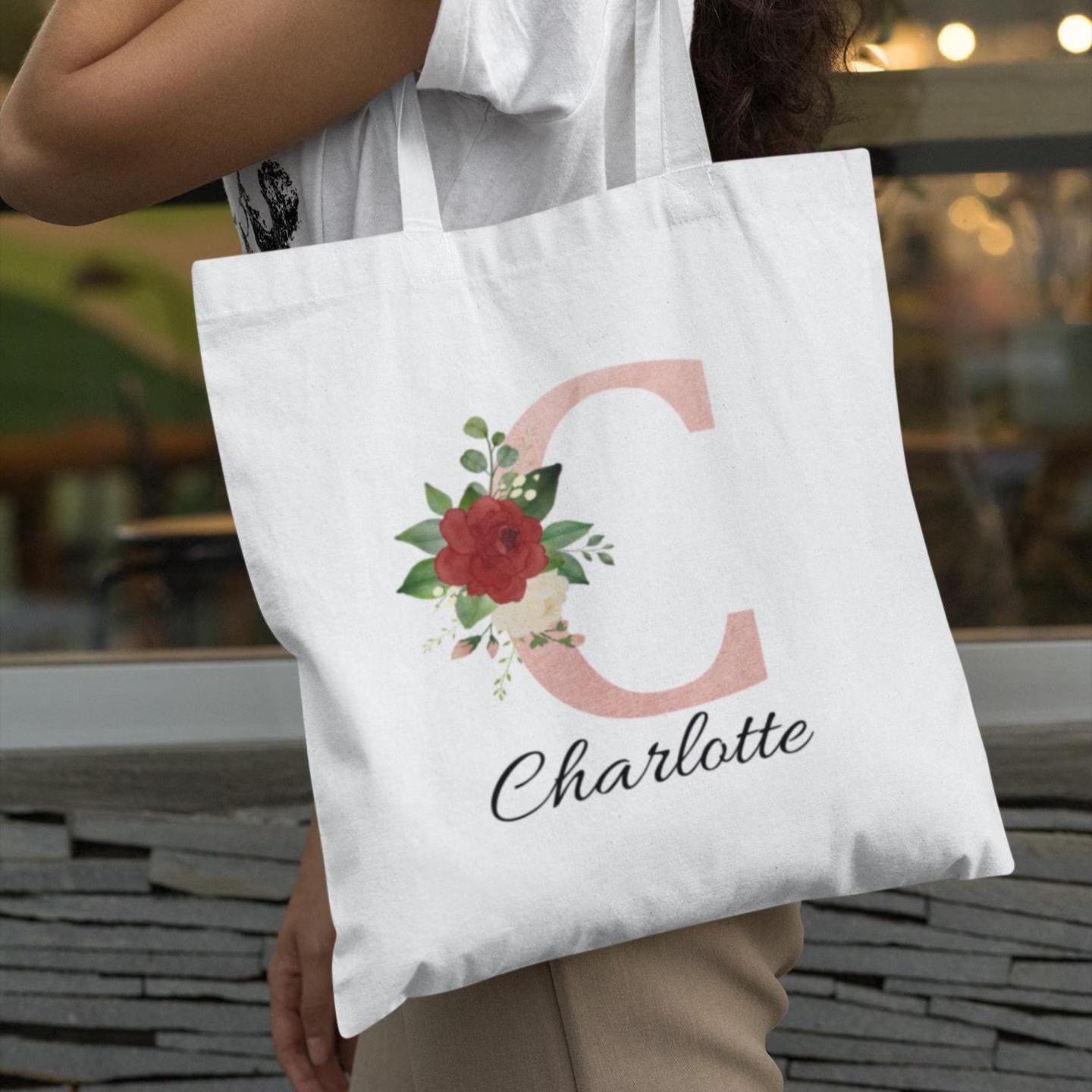 Close-up of Blush Pink and Roses Floral Custom Tote Bag featuring initial C and name Charlotte, ideal for personalized gifts