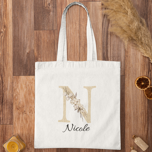Champagne gold and ivory floral alphabet initials design set showing all letters for custom personalized tote bags