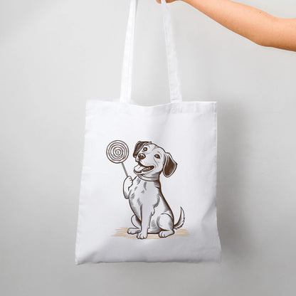White tote bag with cute dog and lollipop design held by hand, perfect minimalist gift for dog owners