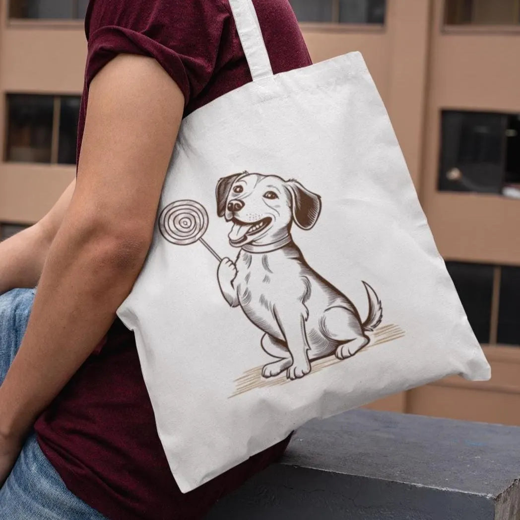 Man wearing eco-friendly tote bag featuring cute dog with lollipop illustration, minimalist design for animal lovers
