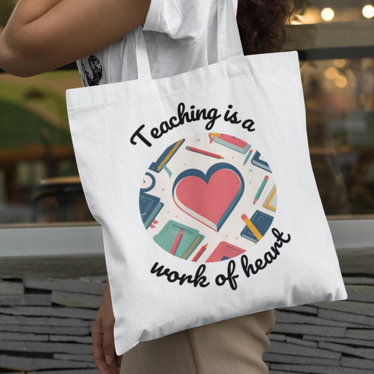 Heart Of A Teacher tote bag carried on shoulder – perfect appreciation gift for teachers