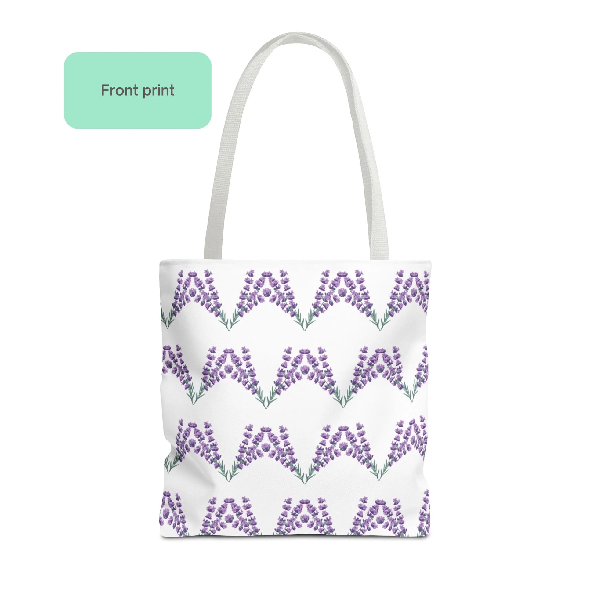 Front print of lavender flower design tote bag featuring purple lavender floral pattern in rows on white fabric