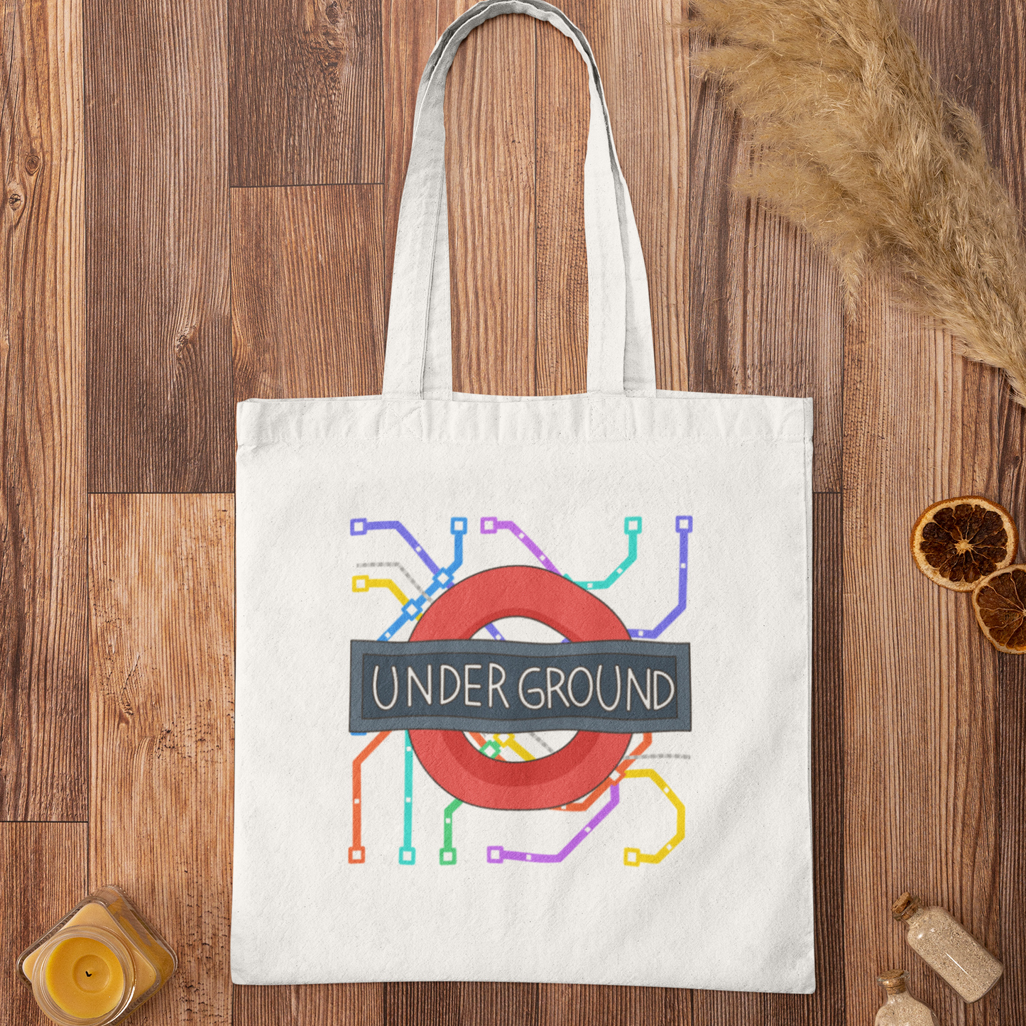 White London Underground map graphic tote bag flatlay on wooden surface – stylish city travel accessory