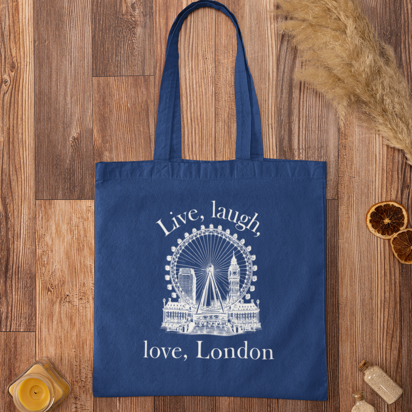 Royal blue Love London City Tote Bag with London Eye and Big Ben illustration on rustic wood surface