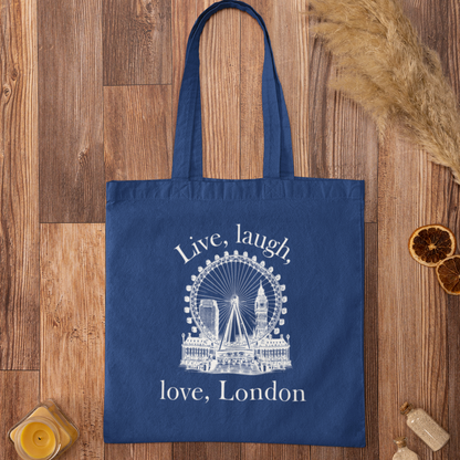 Royal blue Love London City Tote Bag with London Eye and Big Ben illustration on rustic wood surface