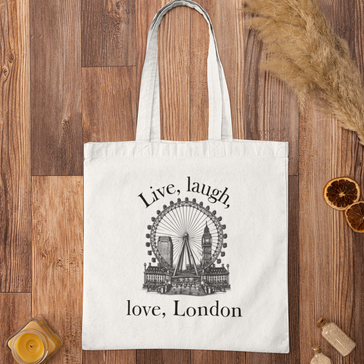 White Love London City Tote Bag featuring black London Eye and skyline illustration on wooden surface