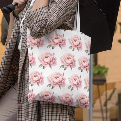 Woman carrying Pink Peony Bloom Pattern Floral Design Tote Bag in city street, showing elegant floral style
