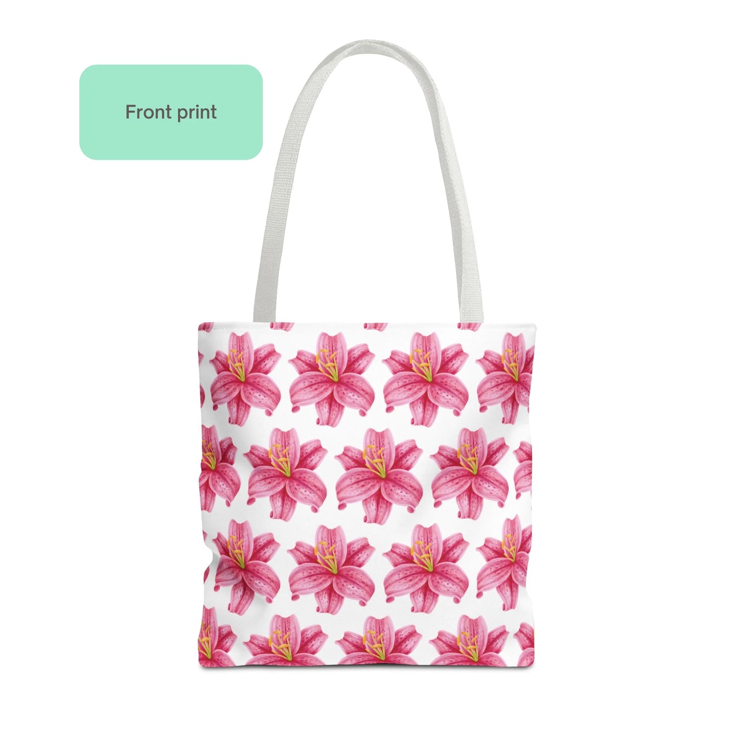 Front print of pink lily flower patterned tote bag with soft white background and bright pink lilies