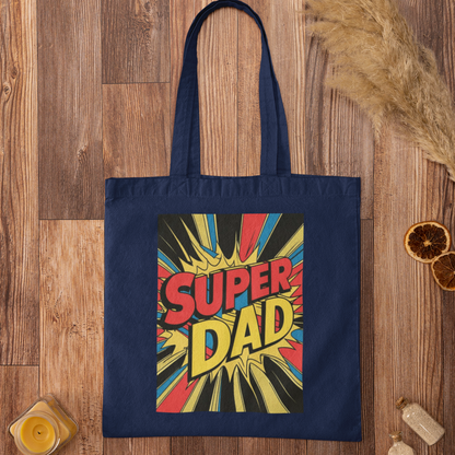 Navy blue tote bag with 'Super Dad' design on a wooden surface