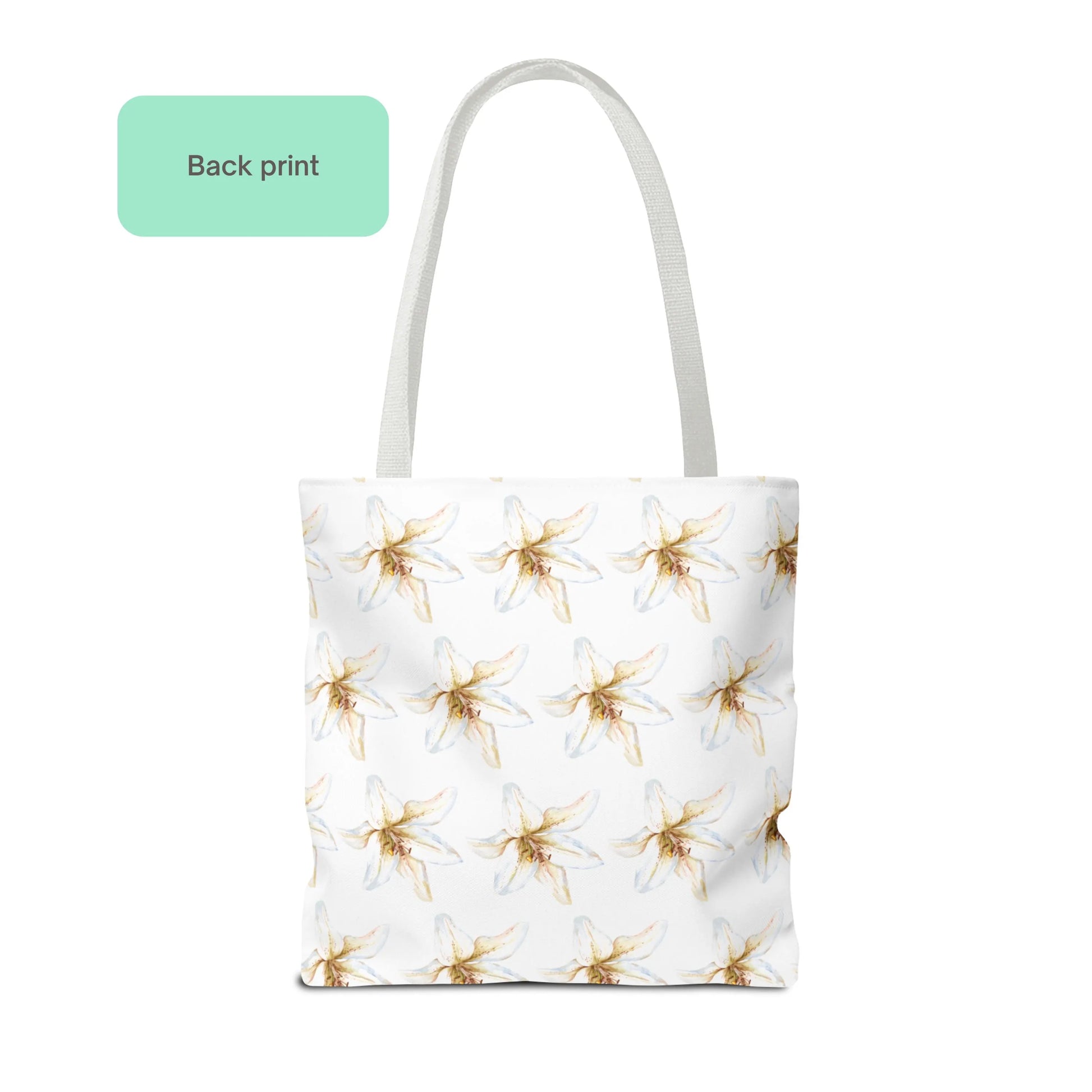 Back view of White Lily Flower Design Tote Bag with repeating white lily pattern on a light background.